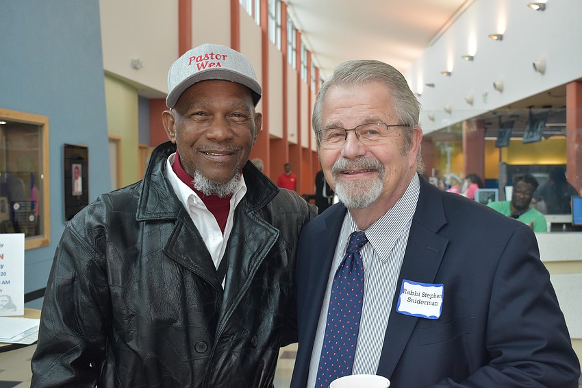 Leaders of different faiths came together to celebrate, including Rev. Wesley Tunstall of Sarasota, who led the walk, and Rabbi Stephen Sniderman of Longboat Key, during the 2025 Dr. Martin Luther King Jr. Unity Walk.