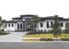 This Wild Blue at Waterside home at  612 Blue Shell Loop sold for  $3,472,800. Built in 2025, it has four bedrooms, four-and-a-half baths, a pool and 3,979 square feet of living area.