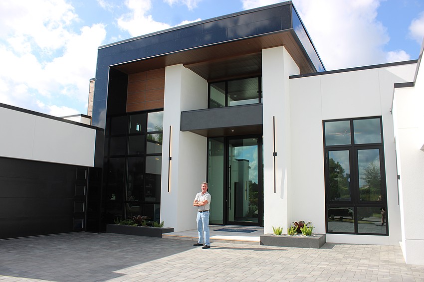 John Cannon stands in front of his 