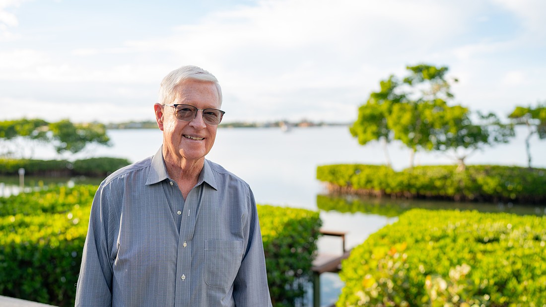 Nick Gladding poses for a photo in his Sarasota Bay-facing backyard Friday, Jan. 2. In March, Gladding will be sworn in as the next Longboat Key District 3 Commissioner.
