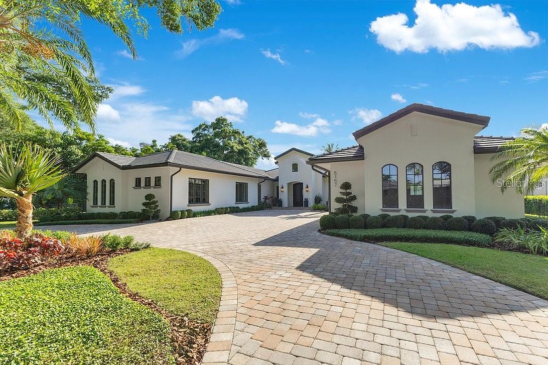 The home at 5157 Latrobe Drive, Windermere, sold Dec. 30, for $4,400,000. Fully rebuilt and expanded in 2019, this single-story golf-front estate offers panoramic views of Hole 4. The sellers were represented by Monica Lochmandy, Isleworth Realty LLC.