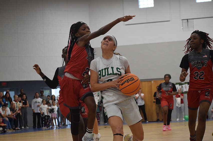 Driving to the basket, Eva Lopes tries to get past an opponent from Sarasota School of Arts and Sciences. Her 509 career points with the Bulls more than quadruple the program's previous all-time record of 125. Driving to the basket, Eva Lopes tries to get past an opponent from Sarasota School of Arts and Sciences. Her 509 career points with the Bulls more than quadruple the program's previous all-time record of 125.