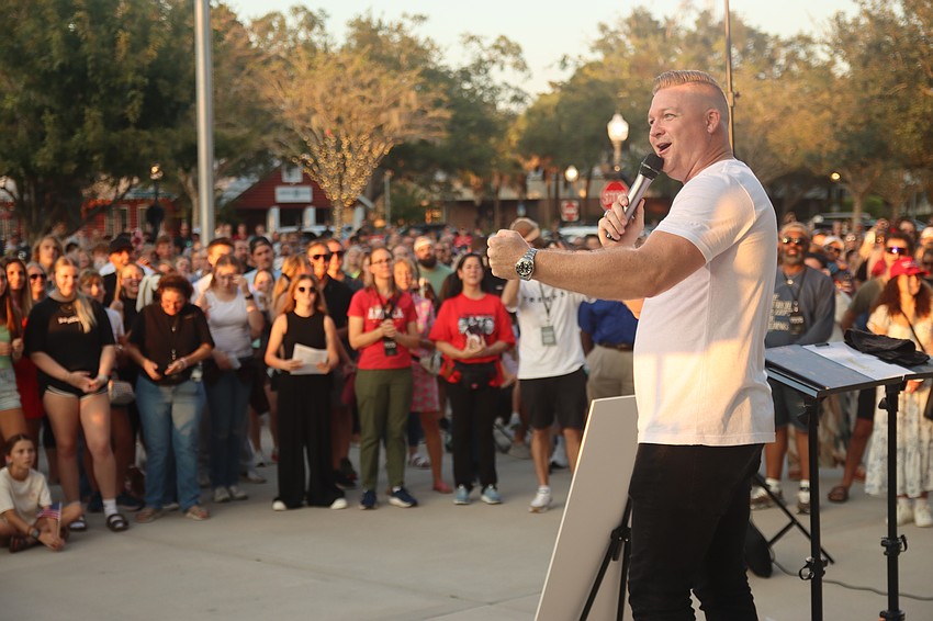 Chris Mikkelson led a candlelight vigil for Charlie Kirk on the steps of Winter Garden City Hall.