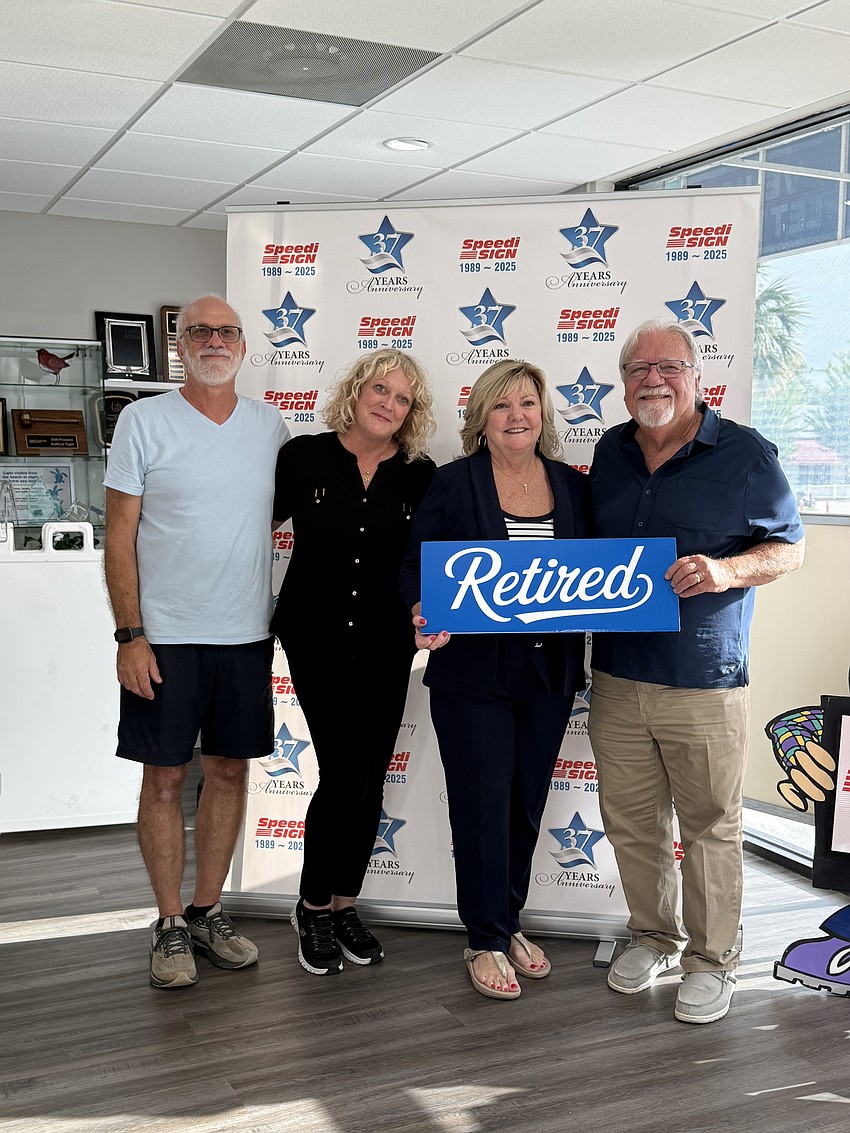 Speedi Sign employees Tim Copello and Lisa Dellea with founders Carla and Ron Cornelius. Copello has worked for Speedi Sign for 25 years and Dellea has worked for the business for three years. Courtesy photo