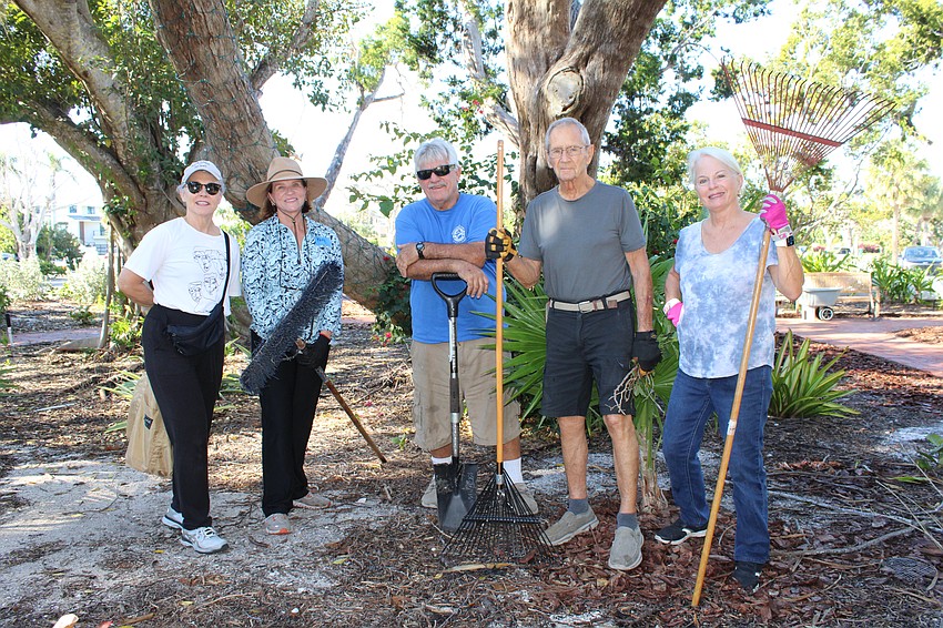 Rhonda Pfaff, Kelly Shrout, Jack Joyce, Bob Mazurek and Linda Crouse volunteered to help fix up the Friendship Garden after 