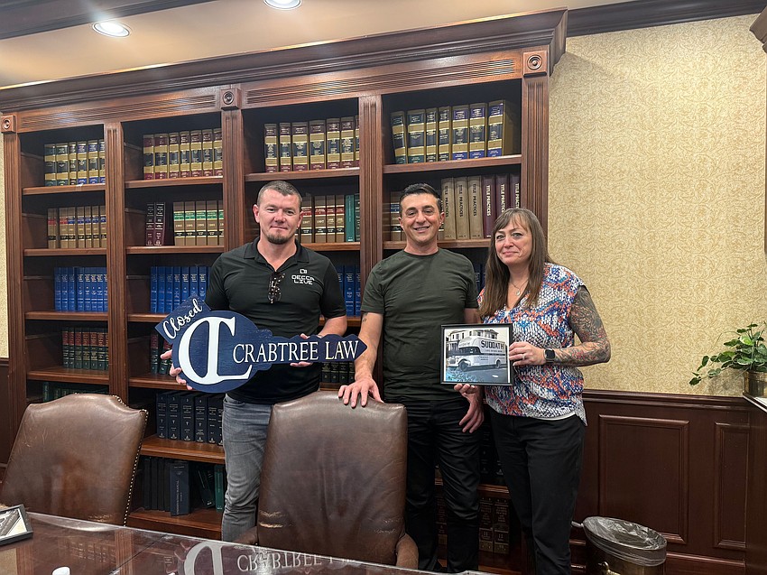 Evanc “Evan” Rajta and Aleksander “Alex” Lukaj of Illyria Properties 8 and Jessica Lee-Miller of the Suddath family.