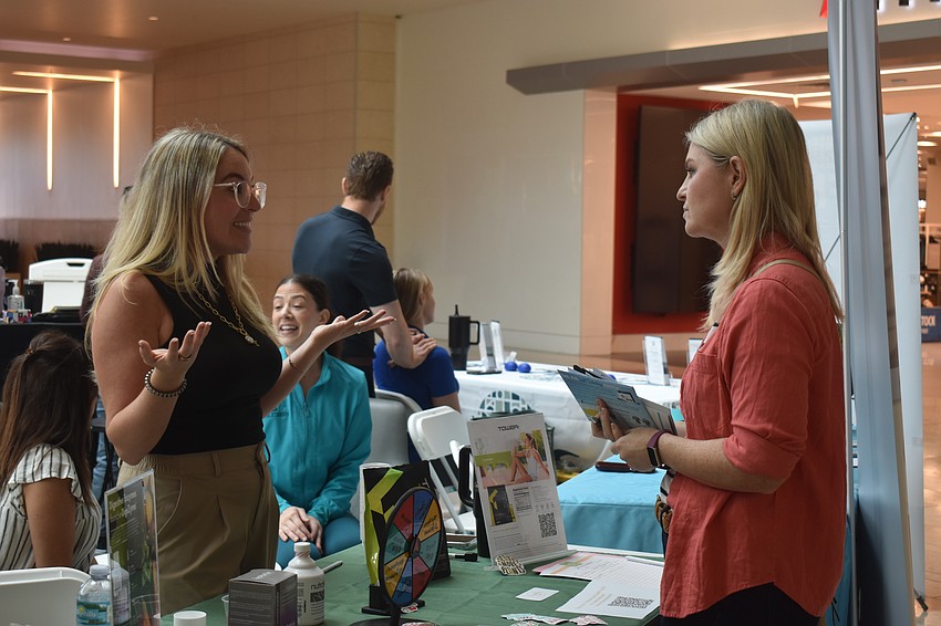 HealThy Self Nutrition's Amanda Rigby, a registered dietician, speaks with Lakewood Ranch's Carrie Ehrlich. Ehrlich is a health coach who owns Transform Wellness and wanted to check out all of the information the expo provides.