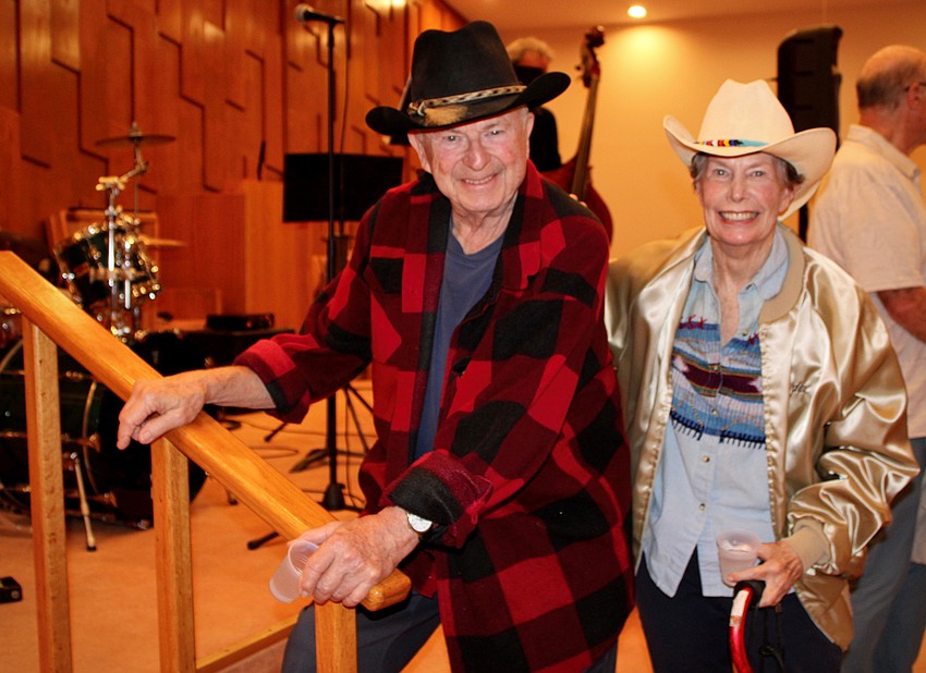 Bob and Linda Rosenbluth sport their sharpest cowboy hats — Bob's from his father-in-law and Linda's from her mother — at the Yiddish Cowboys' performance at The Education Center on Jan. 11.