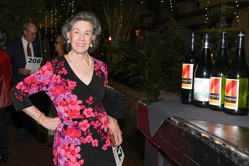 Pretty in pink at the Perlman Celebration Dinner is Cornelia Matson.