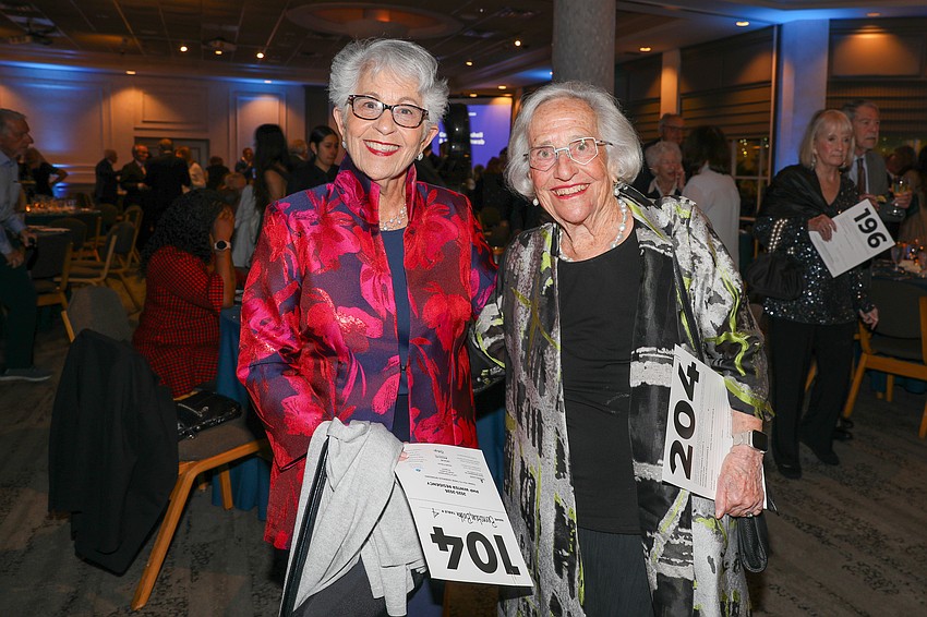 Bobbi Bernstein and Judy Katz look forward to an evening of music and food.