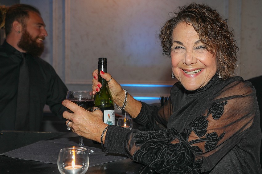 Ronnie Riceberg scores that bottle of red. 