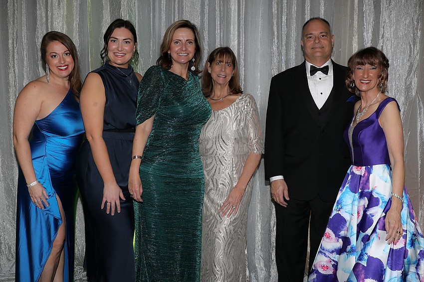 Ali Orme, Marina Olson, Robyn Faucy and Cyndi Miller with Jonathan and Allison Laronge.