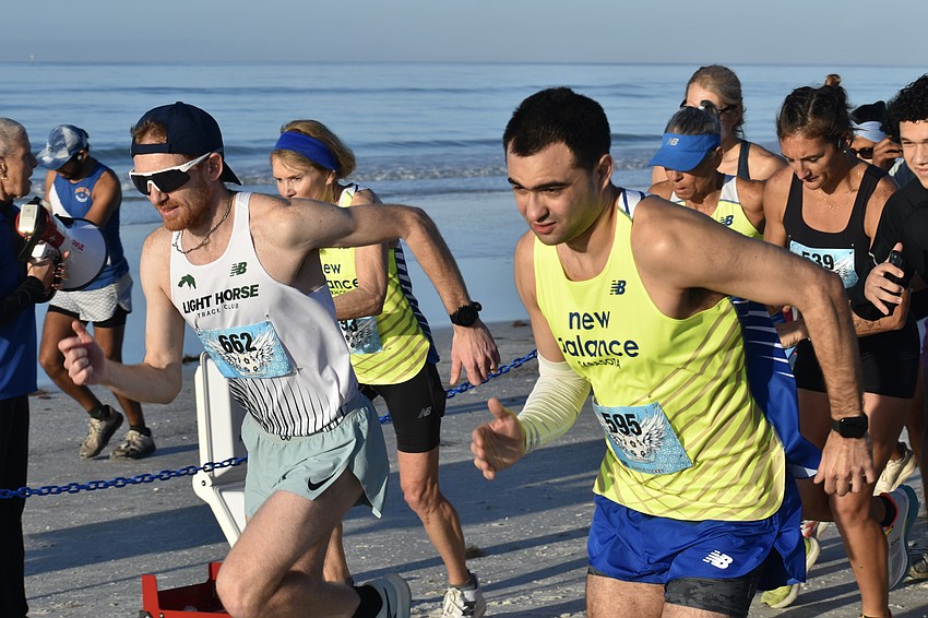 Overall first place winner and overall second place winner Alexis Giraudineau and Sebastian Kovendy head out for a start.