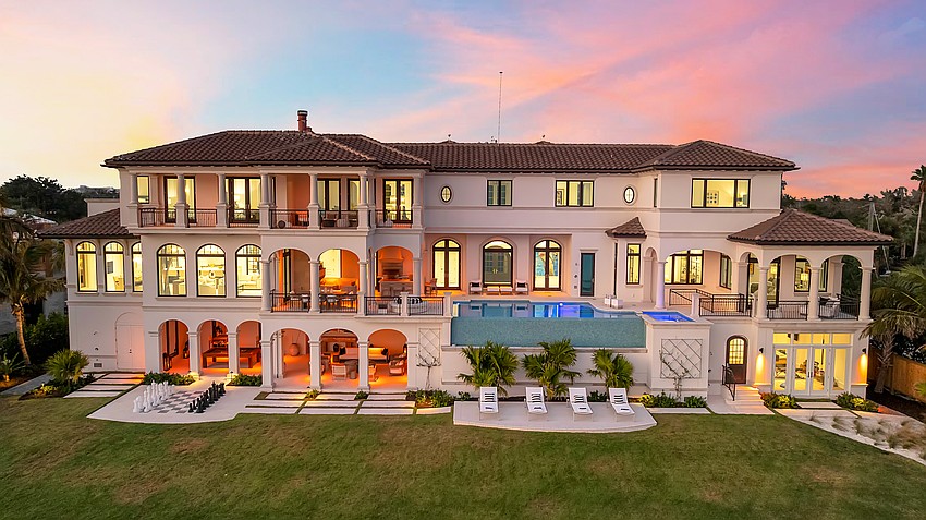 Arched loggias connect outdoor and indoor living spaces.