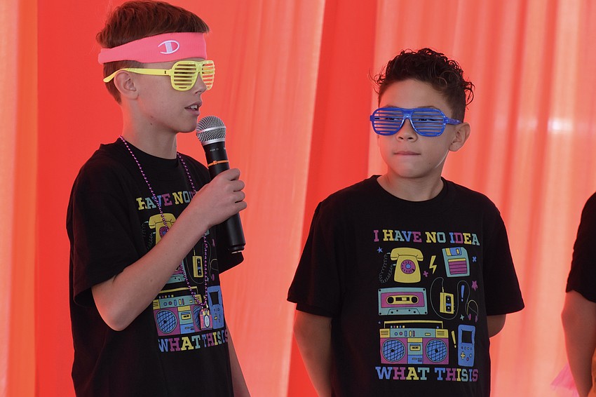 Fifth graders Ben Buckley and Novak Kratochvile Villacis discuss the 1980s.