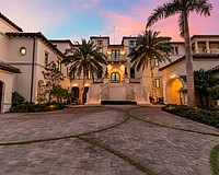A double staircase leads to 7366 Point of Rocks Road on Siesta Key.