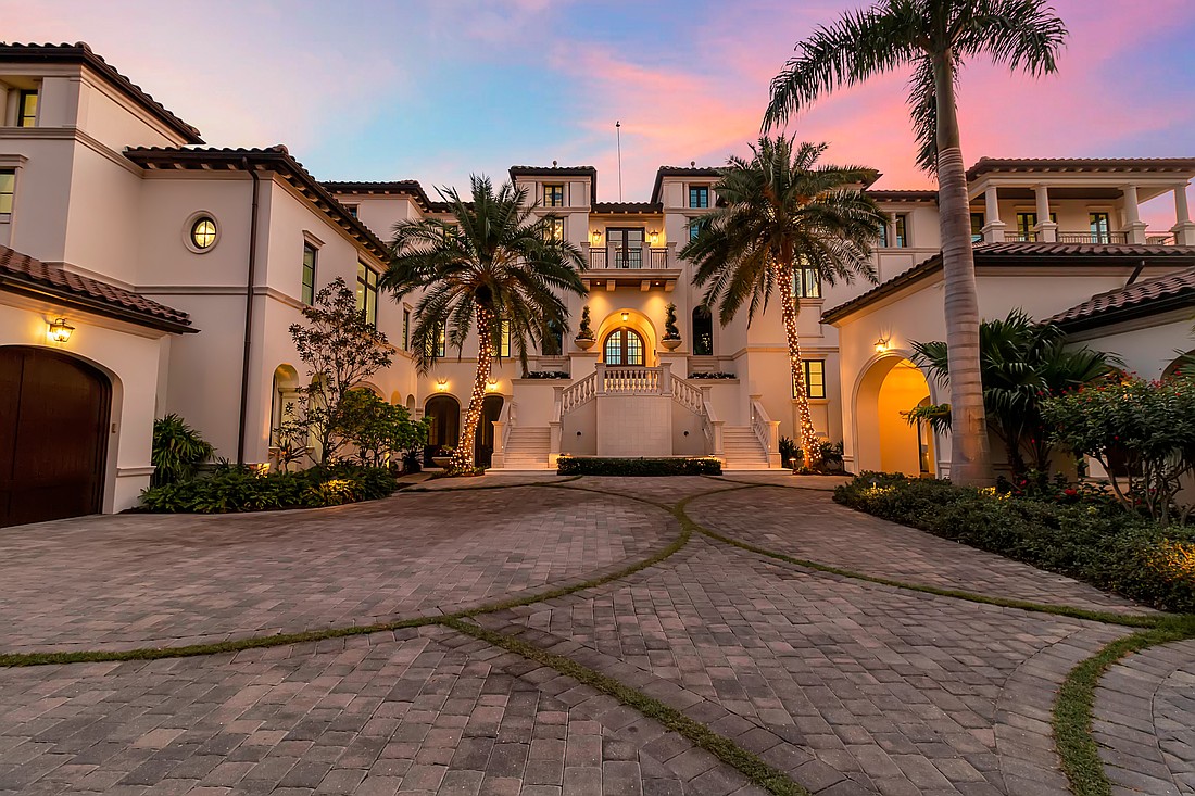 A double staircase leads to 7366 Point of Rocks Road on Siesta Key.