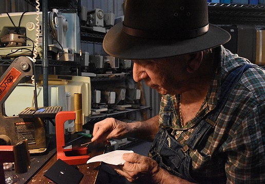 Dennis Brock works on a Magiscope in his workshop.