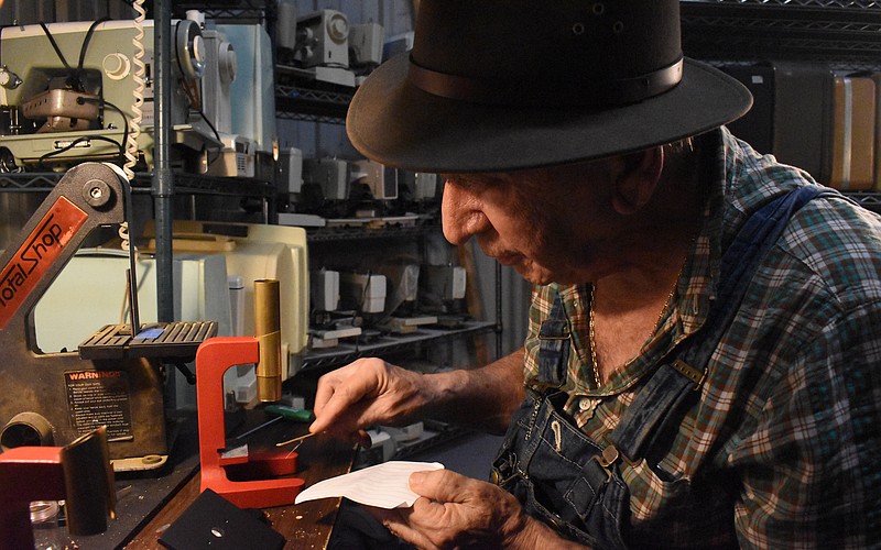 Dennis Brock works on a Magiscope in his workshop.