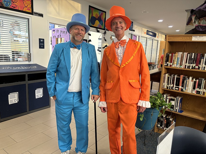 The Out-of-Door Academy's Tim Brewer has worked with Mike Newhams since Newhams joined the staff in 1997. They are known for having fun, which includes when they dressed up as Lloyd Christmas and Harry Dunne from 