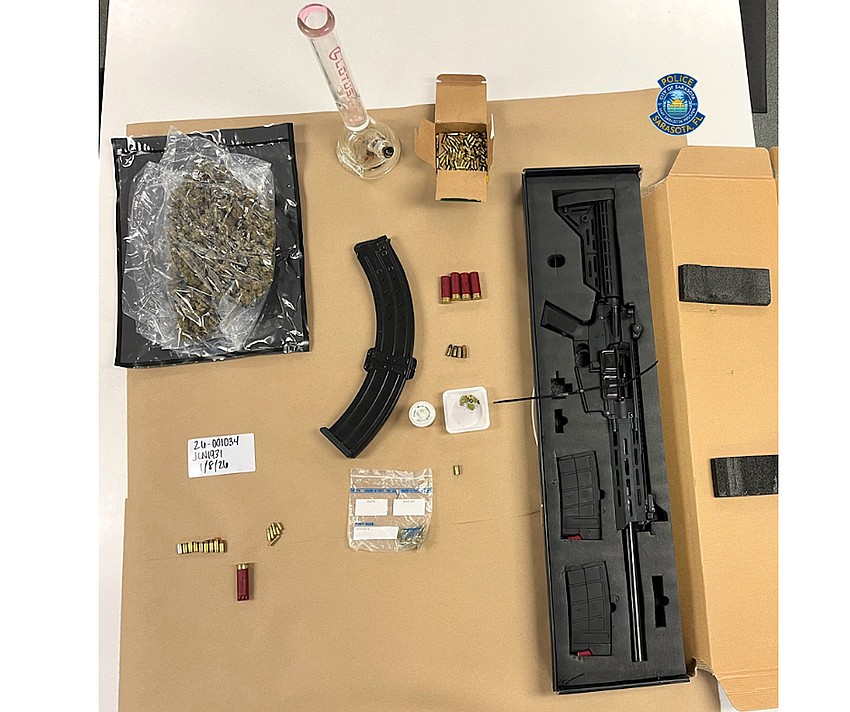 Evidence collected atd 1579 28th St. in Sarasota included illegal weapons, bump stocks ammunition and drugs.