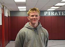 Evan Rowe has distinguished himself in the 165-pound weight class this season and carries aspirations of a top-three finish in March's FHSAA individual championships.