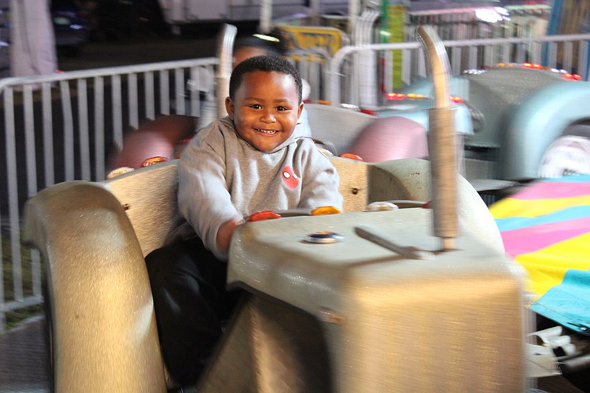 Palmetto's Lavion Smith, 3, is eager to ride every ride he can at the Manatee County Fair.