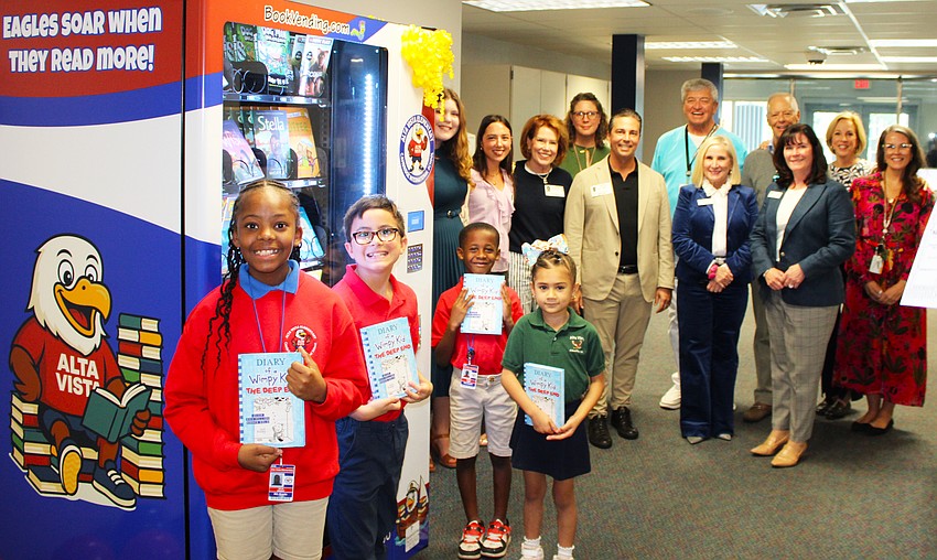 It was an exciting day for students and staff at Alta Vista Elementary School on Jan. 13 as they celebrated the unveiling of the new book vending machine provided by the Sarasota Yacht Club youth board.