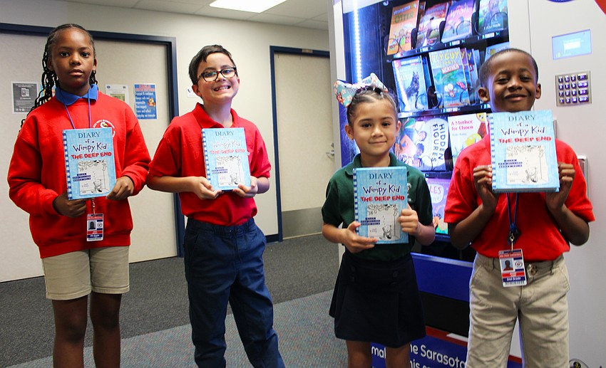 Alta Vista Elementary Schoolstudents Deja (5th grade), Gianni (4th grade), Yoselyn (1st grade) and Andre (2nd grade) all selected the 15th book in the 