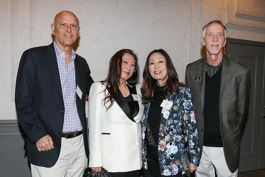 Charlie Huisking, Angela and Jennifer Chun and board member Jeff Sebeika.