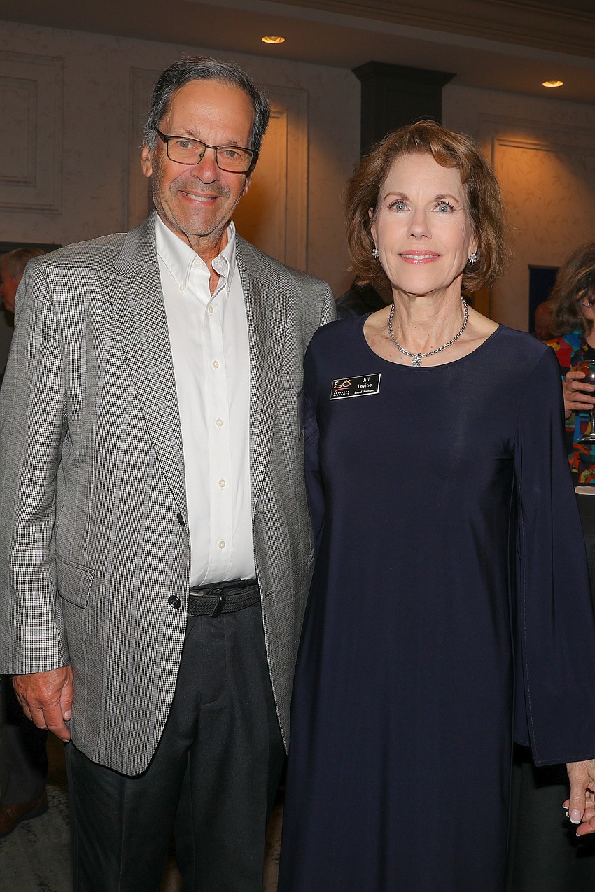 Scott and Jill Levine, who is the board secretary.