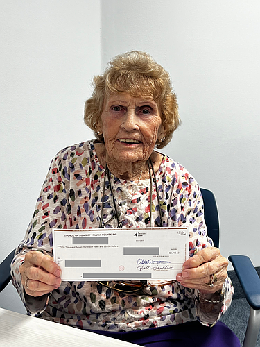 Sylvia Brown holds a check from the Council on Aging. Courtesy photo