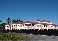 The Harbor Square office building at 4134 Gulf of Mexico Drive may soon be demolished. 1905 Family of Restaurants Vice President of Marketing Jeff Houck said the company plans to file for a demolition permit soon as work to bring the Buccaneer restaurant to the space continues to move forward.