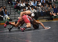 Lakewood Ranch junior Ricardo Rengifo wrestles Javier Puchi in the 138-pound weight class.