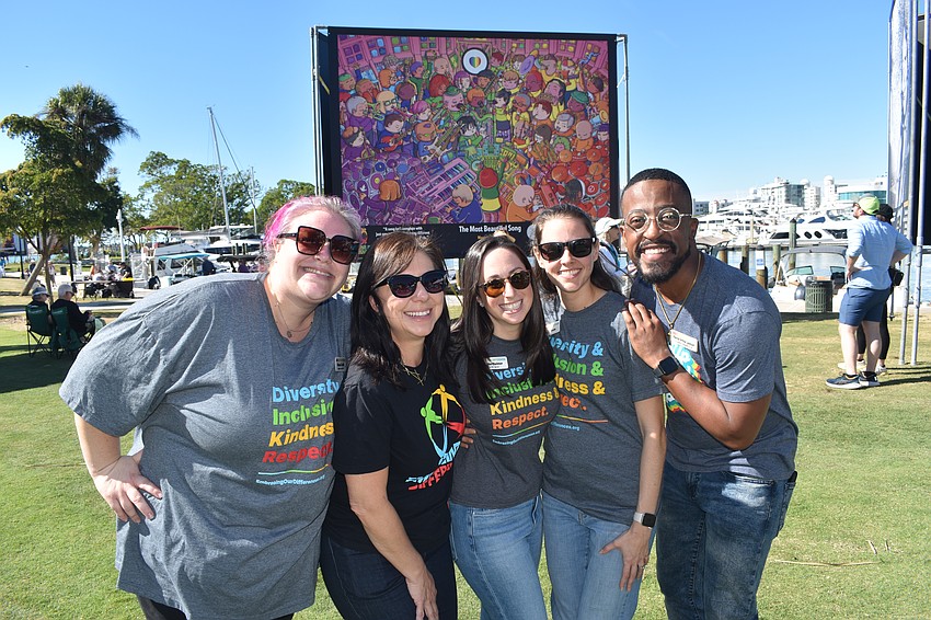 Embracing Our Differences staff pose together, including Michaela Stockhill, engagement director, Christina Fraser, vice president of operations, Sarah Wertheimer, president and CEO, Elizabeth Chicoine, database manager and Patrick Arthur Jackson, vice president of learning and engagement.