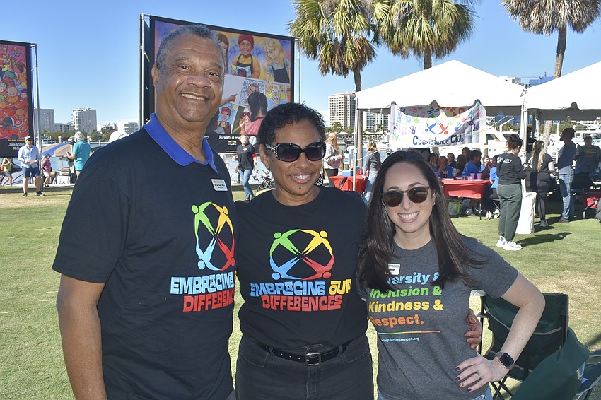 Judge Charles E. Williams, chair of Embracing Our Differences' board of directors, Linda Poteat-Brown, vice chair, and Sarah Wertheimer, president and CEO of the organization, pose together.