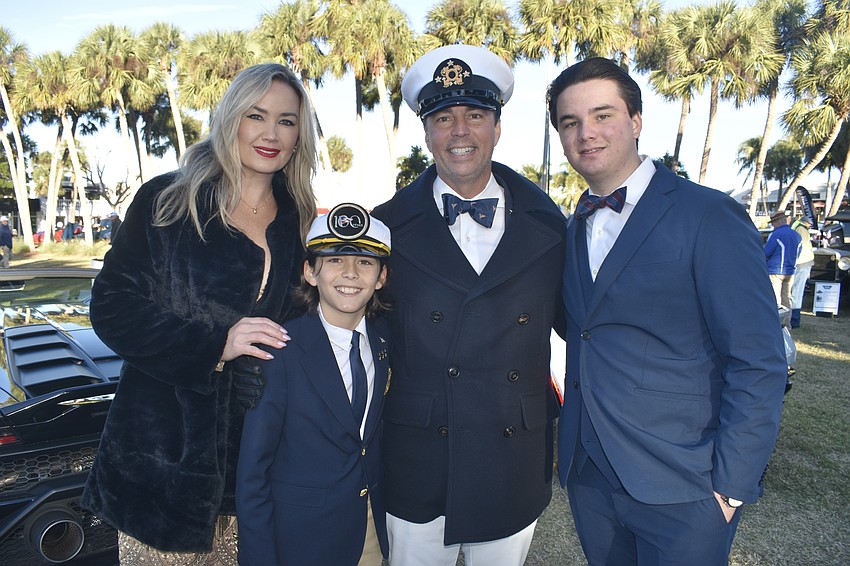 Crystal Milligan, her son Oliver Milligan, 10, husband Robert Milligan, who is commodore of the Sarasota Yacht Club, and son Greyson Milligan, 14, participated in the parade and event.