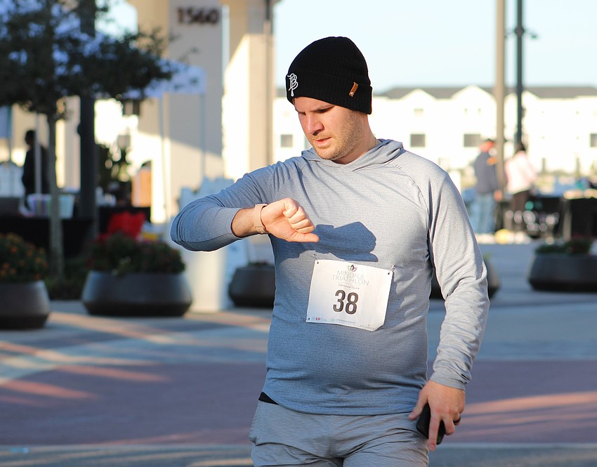 Tyler Drake checked his watch as he finished the race to see a time of 27 minutes and 56 seconds.