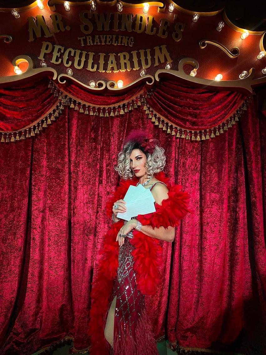 Allison Blei performs as Ms. Sin in Mr. Swindle's Traveling Pecularium.