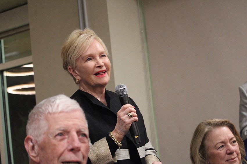Barbara Vandervolk surprises Audible founder Don Katz with memories of their meeting 30 years ago while she served as senior vice president of Recording for the Blind & Dyslexic. Katz spoke to members of the Bird Key Yacht Club on Jan. 9 at The Ora as part of the seafarers speaker series.