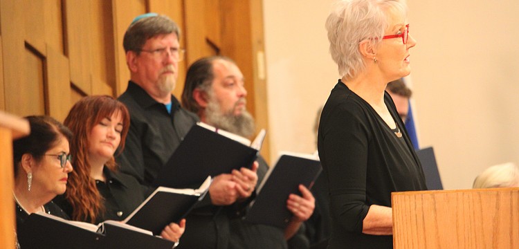 Soloist Kei Sulhi, backed by fellow members of the Temple Beth Israel choir, offers her annual rendition of “The King of Love is Dead,” originally sung by Nina Simone and written by Gene Taylor, in memory of Martin Luther King Jr. at a special Shabbat service.