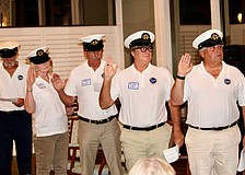 Leaders from the Longboat Harbour Yacht Club participate in the swearing-in ceremony during the Jan. 17 Change of Watch. From left, John Shea, dockmaster; Susan Luke, purser; Herb Ritchell, scribe; Mike Perez, vice commodore; and Jeff Hecklau, commodore.