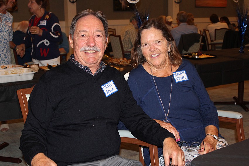 Former Longboat Harbour Yacht Club Commodores Joe and Kathy Sever applaud the newest fleet leaders at the Change of Watch on Jan. 17.
