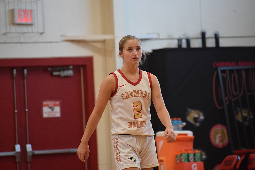 Talia Busser, a senior guard, walks up the court following a timeout. The Newberry College commit averaged 9.6 points, 1.8 rebounds and 1.8 assists per game for Cardinal Mooney last season en route to its state title.