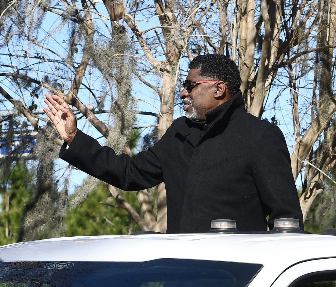 Ocoee District 4 Commissioner George Oliver III smiled from atop his vehicle. He is the first African American to be elected as a commissioner in Ocoee.