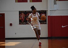 Junior guard Jadyn Watts takes the ball downcourt for Cardinal Mooney girls basketball during a Jan. 17 game against The Villages Charter. After transferring from Sickles, she has been a top scorer amid an up-and-down season for the Cougars.