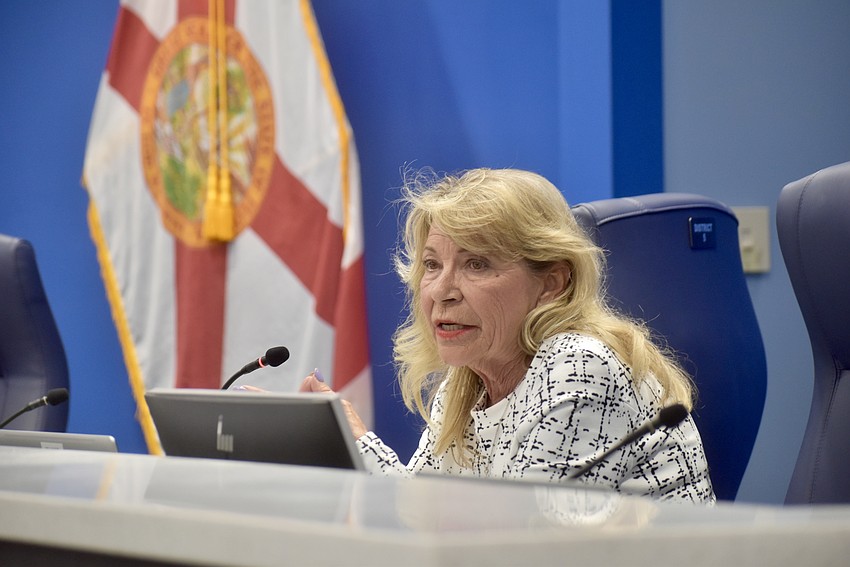 Commissioner Carol Felts pushes for a negotiation on the purchase price, but is outvoted 5-1.