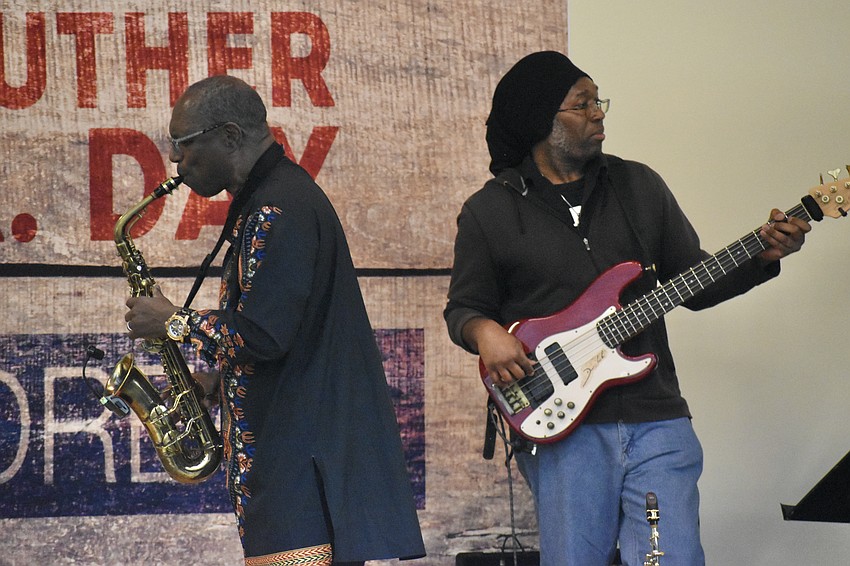 John Walker, Jr. performs alongside Johnny Barker.