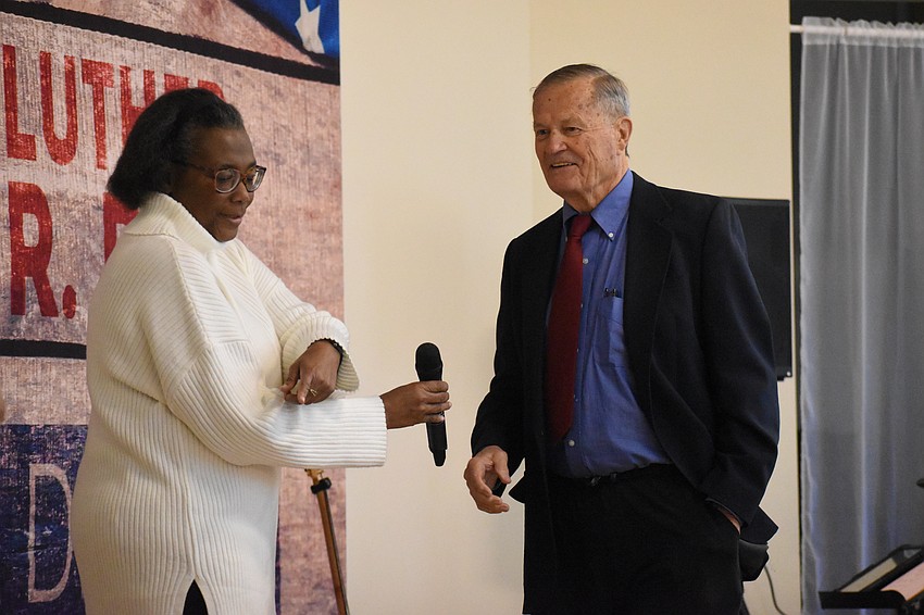 Bel Feltner greets David Morse, president of Sarasota Prostate Initiative and Men to Men, who was honoerd for his work in healthcare.