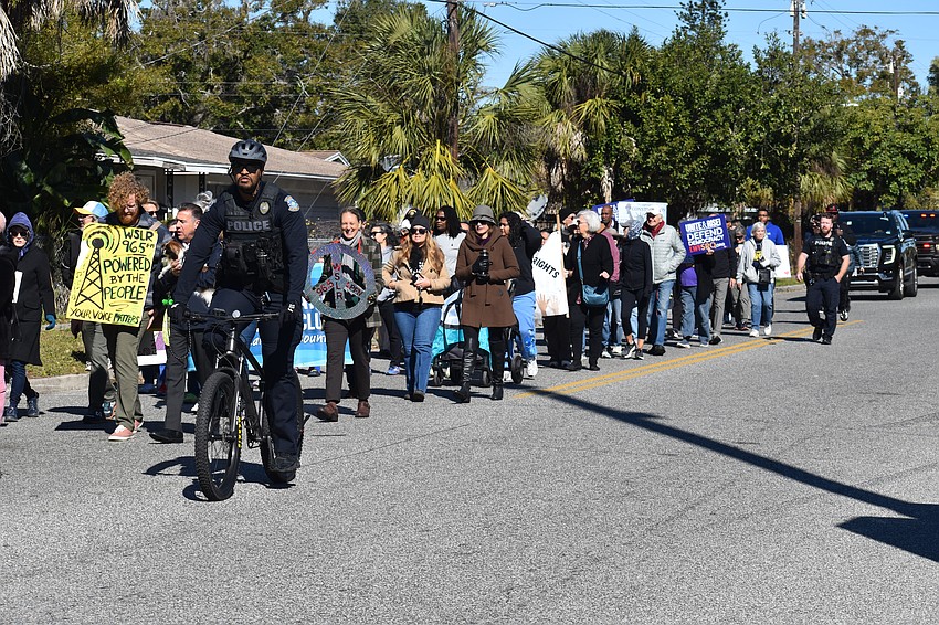 Walkers head out on the parade route.